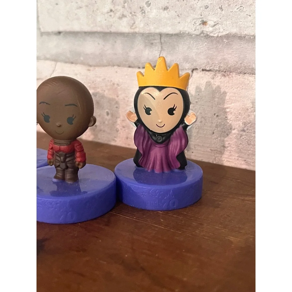 Lot of 4 McDonald's Disneyland 70th Storm Trooper Okoye Evil Queen Donald Duck